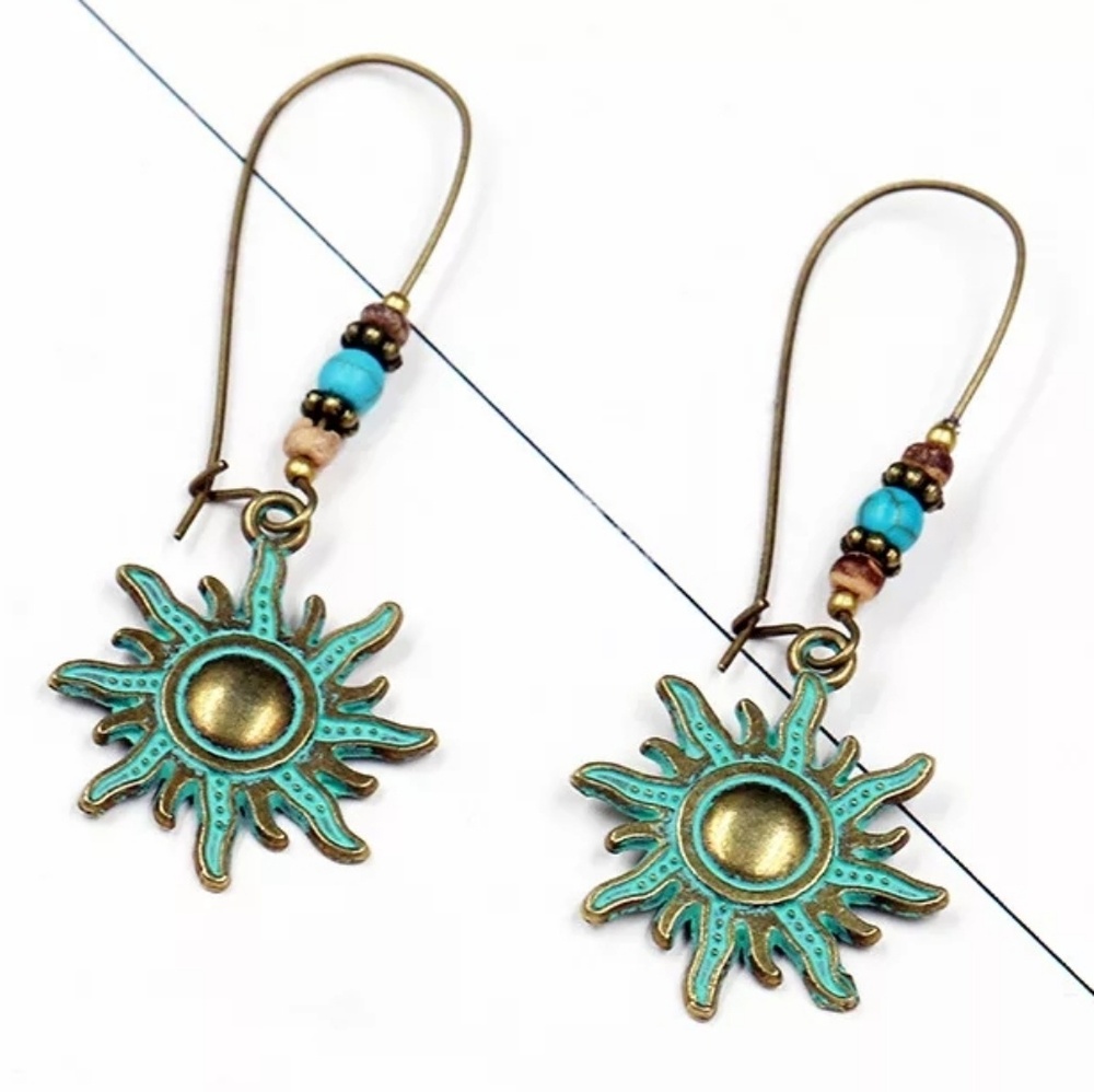 Blazing sun in ancient blue dangle earrings